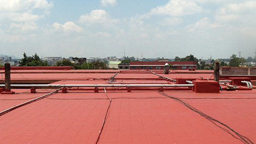 A construction worker is guiding a cement mixer truck chute as concrete is being offloaded for a new house footing. The background is overcast blue sky with another worker, wearing a safety vest, cleaning a mixer chute. http://www.banksphotos.com/LightboxBanners/Concrete.jpg